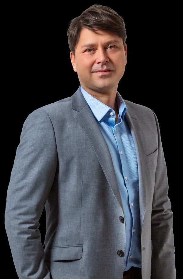 Mark – Sales Manager bei Visual Conversion im grauen Sakko und blauen Hemd